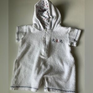 Kissy kissy baby boy coverups color white, short sleeves.  Size 6-9M.